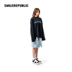 Denim Blue Metallic Coated Washed Denim Skirt with Asymmetric Front Slit and Raw Hem for Women