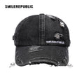 Black Distressed Denim Baseball Cap with Pearl-Tone Pendant and Metal Ring Details