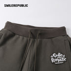 Dark Green 100% Cotton A-Line Wide Leg Sweatpants with Drawstring Waist and Logo Graphic