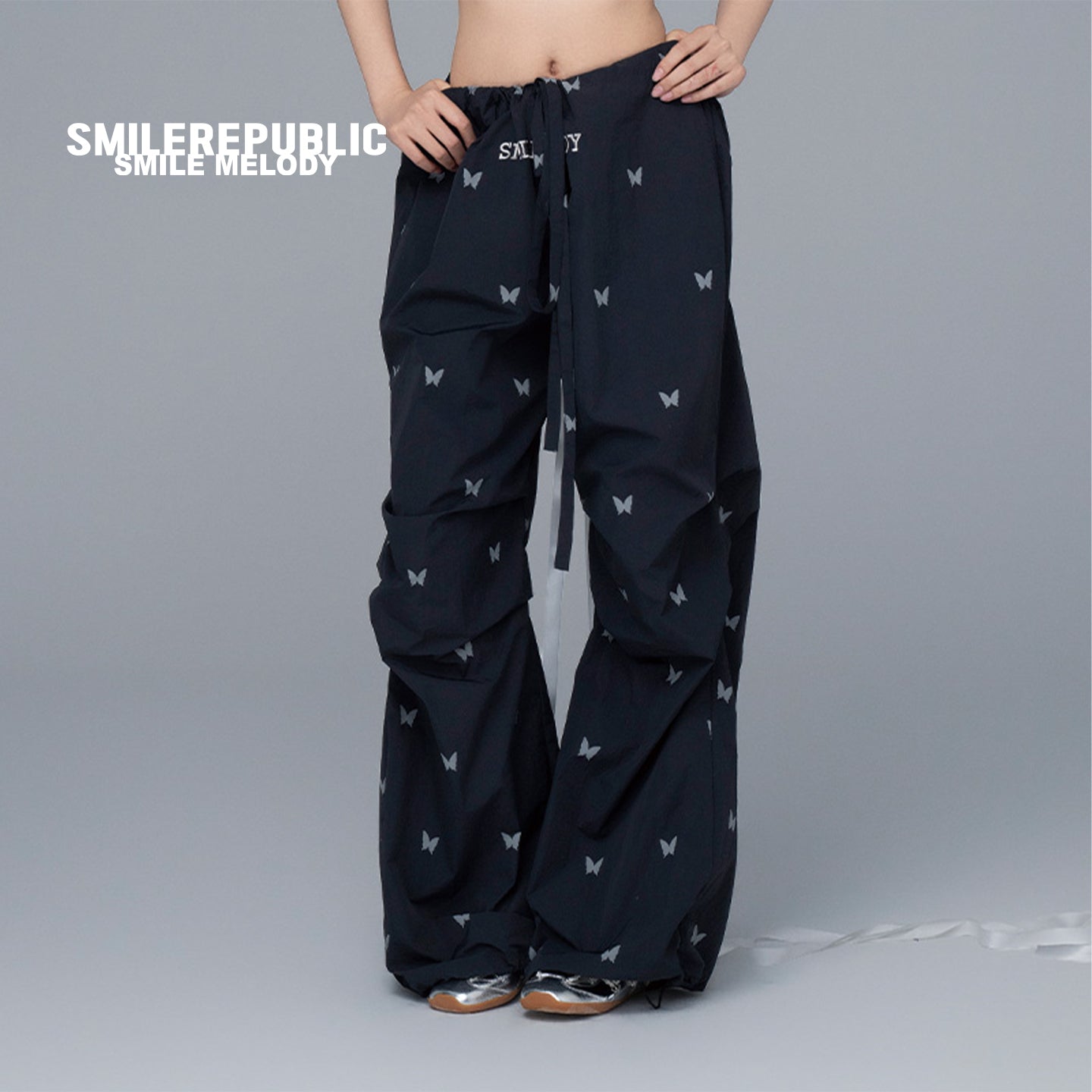Black 100% Nylon Allover Butterfly Print Wide-Leg Parachute Pants with Drawstring Waist for Women