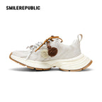 Off-White Burnished Leather Low Top Chunky Sneakers with Tassel Charms, Unisex