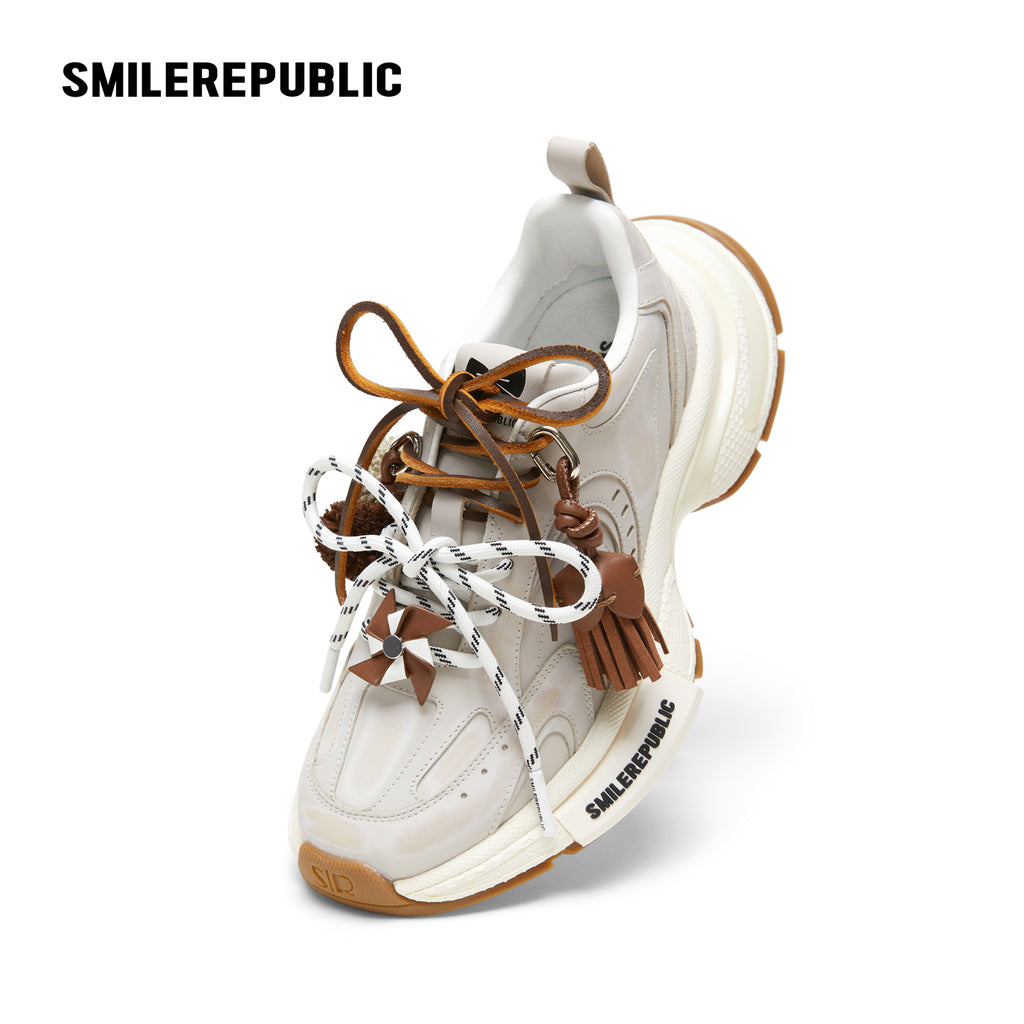 Off-White Burnished Leather Low Top Chunky Sneakers with Tassel Charms, Unisex