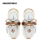 Off-White Burnished Leather Low Top Chunky Sneakers with Tassel Charms, Unisex