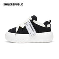 Black Canvas Interchangeable Smile Toe Chunky Platform Sneakers with Airplane Ticket Tag