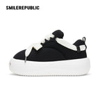 Black Canvas Interchangeable Smile Toe Chunky Platform Sneakers with Airplane Ticket Tag