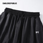 Black Satin Polyester Wide Leg Drawstring Pants with Elastic Waist and Logo Detail