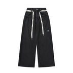 Black Washed Wide Leg Jeans with Adjustable Waist Straps and Relaxed Fit Design