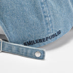 Light Blue Denim Baseball Cap with Metal Smile Logo Detail Adjustable Strap Unisex Hat